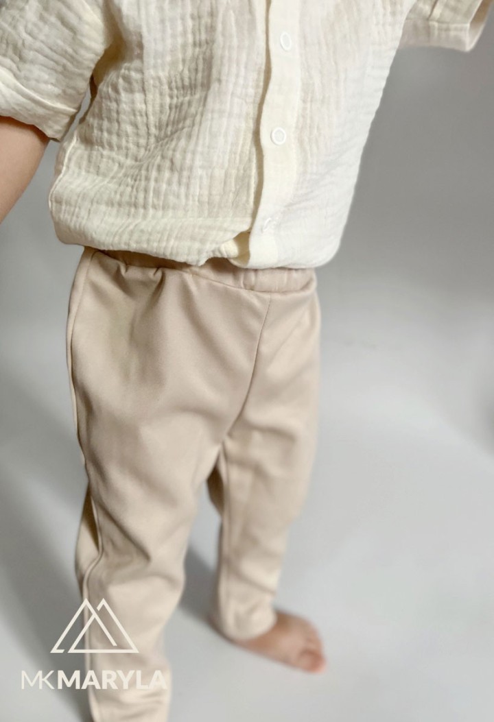Boys' beige pants - lightweight and comfortable. Manufacturer MKMaryla
