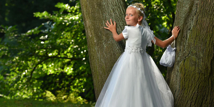 Sukienki komunijne XXL - co wybrać dla dziewczynki o zaokrąglonej sylwetce